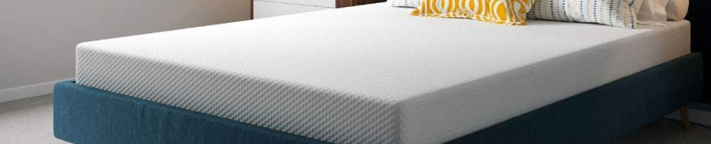 komfi foam mattress on blue velvet bed