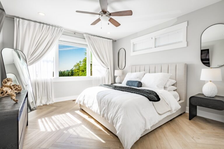 Bed with white lines duvet quilt black and blue accent pillows